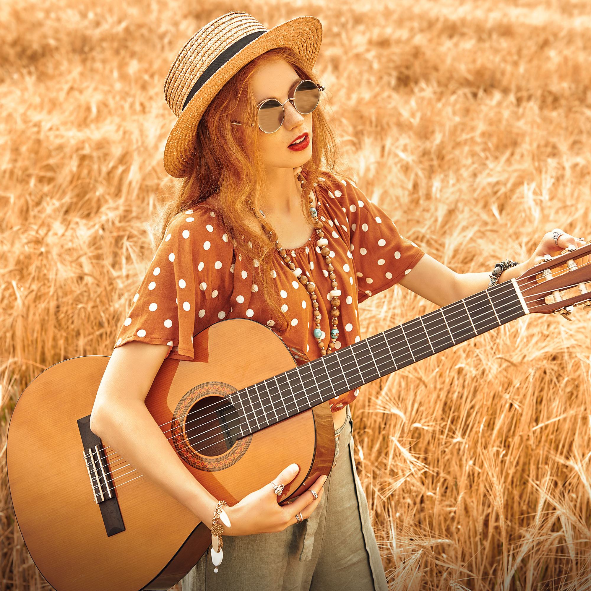 girl plays guitar